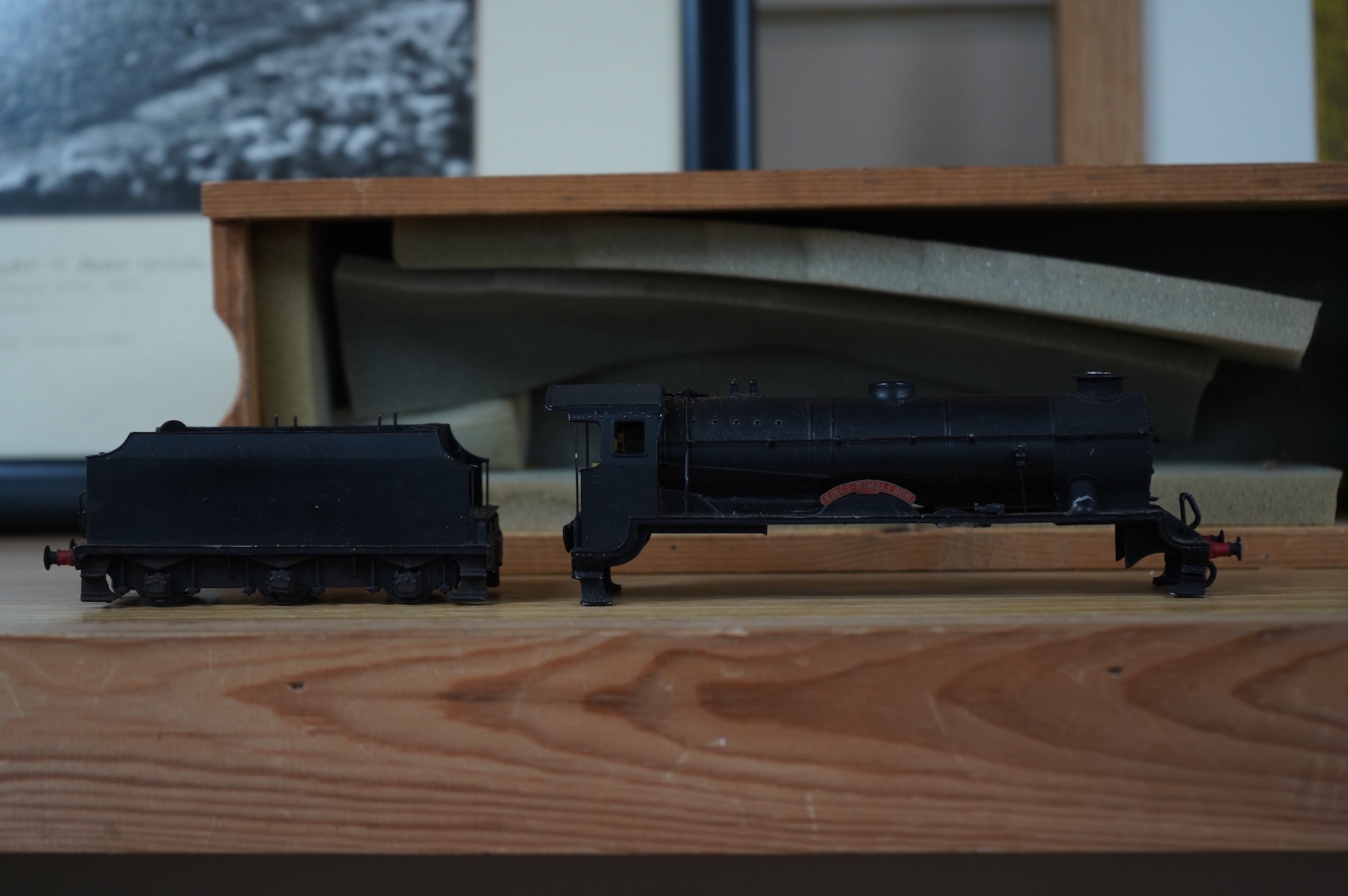 Two kit built and adapted EM gauge LMS railway locomotives; an 0-8-0, 9518, and an 0-6-0 class 4F based on an Airfix kit, together with the body only of an SR Schools Class